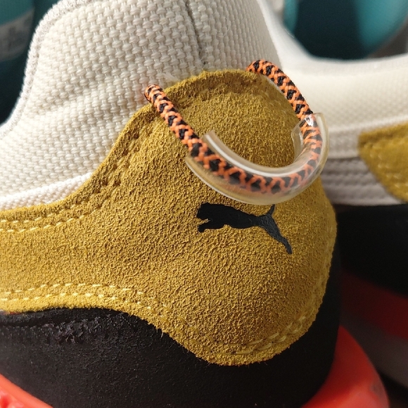 Puma Sneakers with Orange and Yellow Highlights - Picture 3 of 7